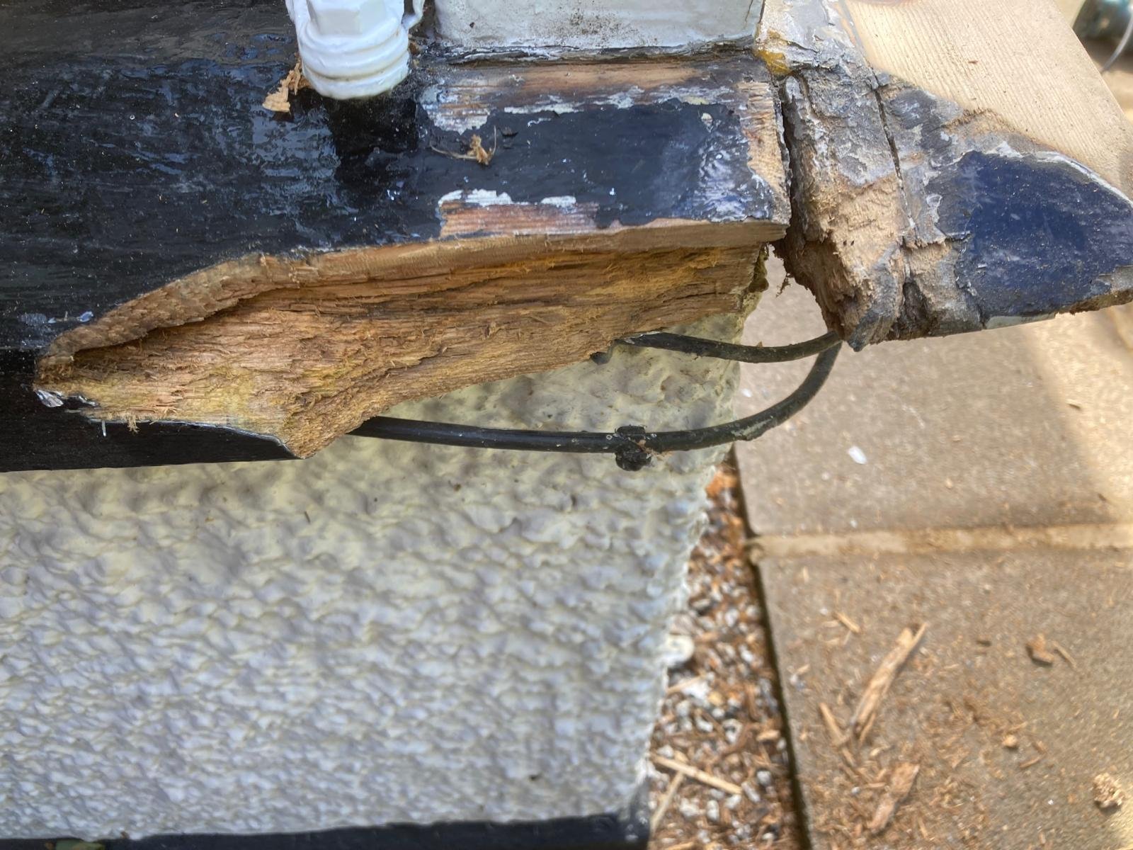 Corner of the bay window sill rotted away