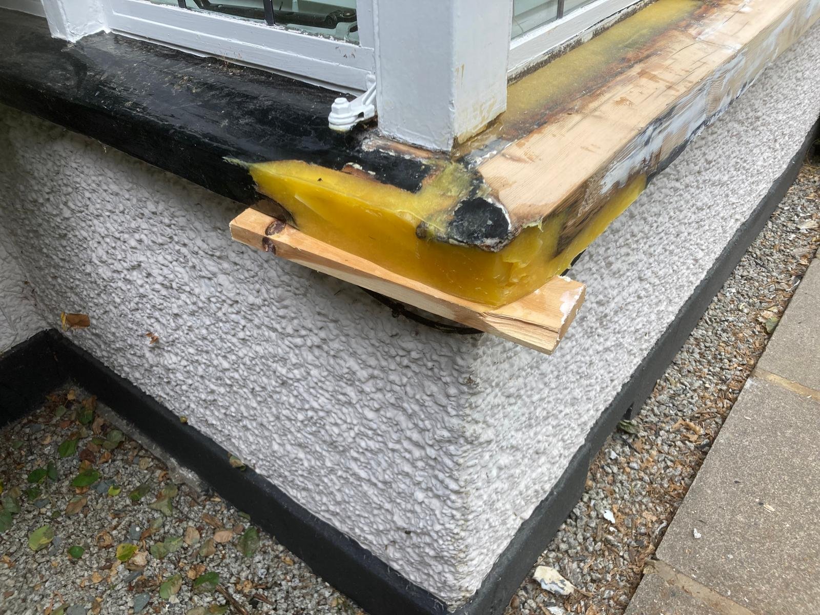 Window sill corner rebuilt with resin