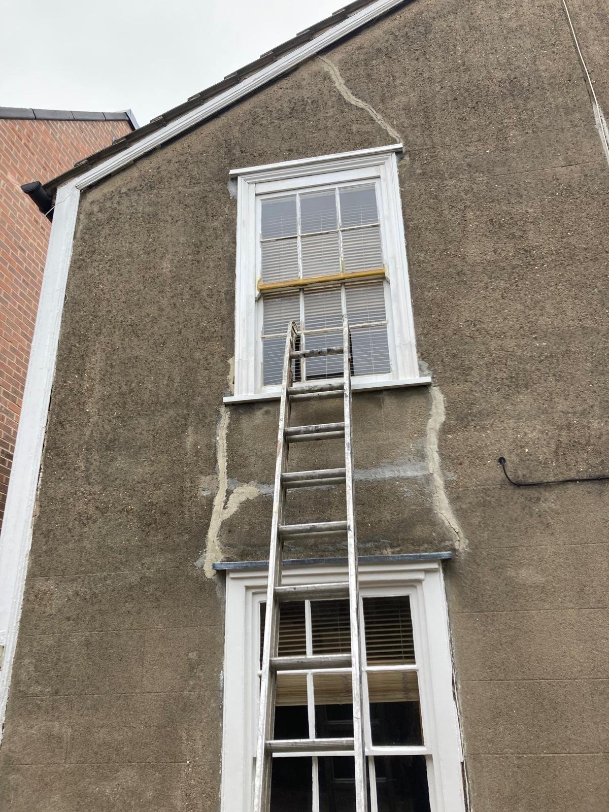 Resin repair to the bottom rail of a sash window