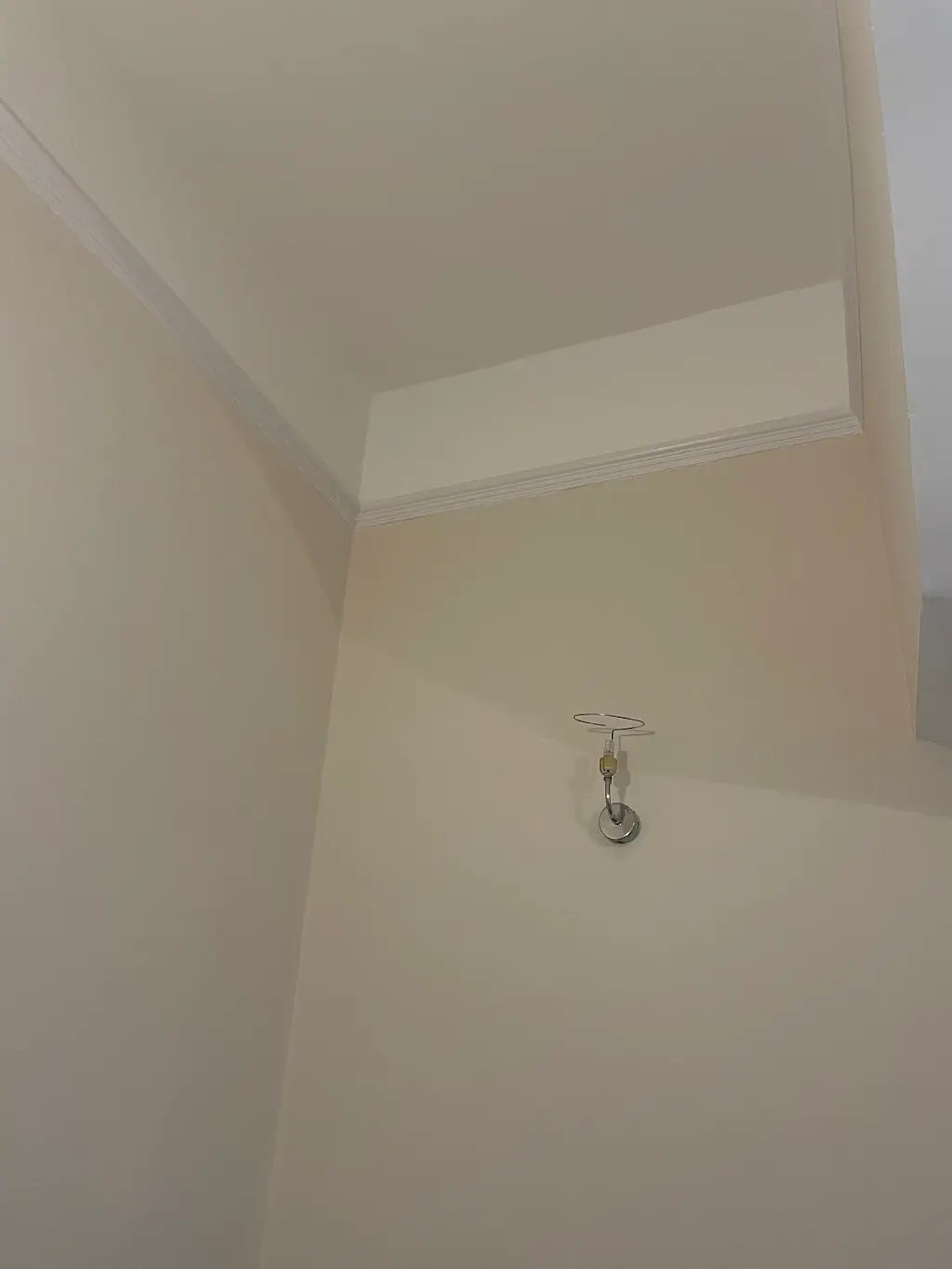 After, Peeling wallpaper stripped back to sound plaster, Living room · Hampton Hill